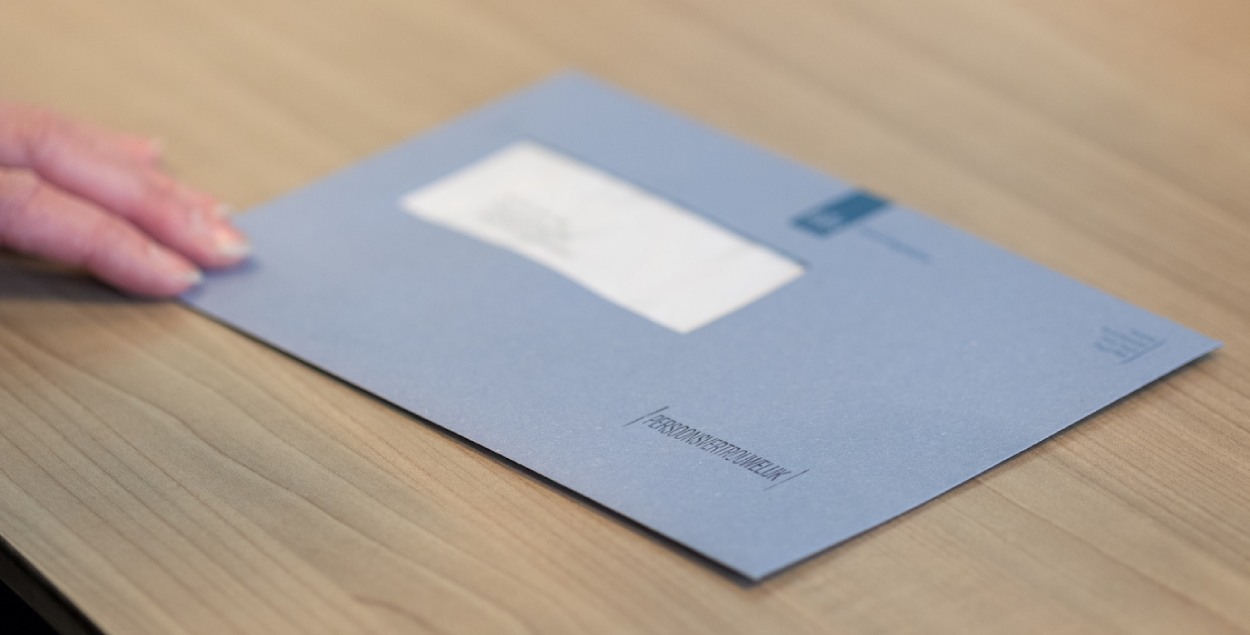 Blue envelope from the tax authorities. 