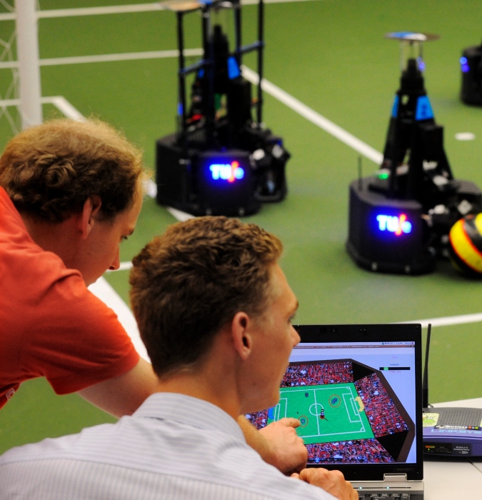 Students playing RoboCup at Technical University Eindhoven